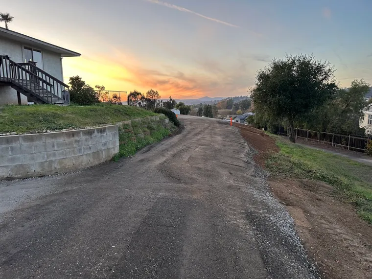 Rehabilitated roadway with fresh base at sunset